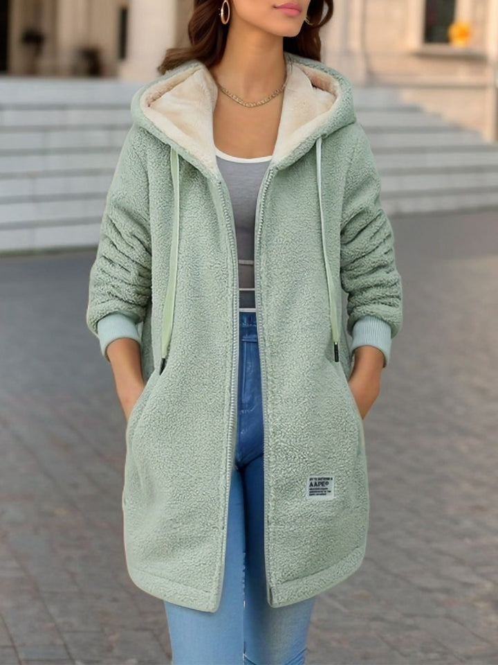 Damen-Fleecejacke mit Kapuze und funktionellem Frontverschluss - Kjersti