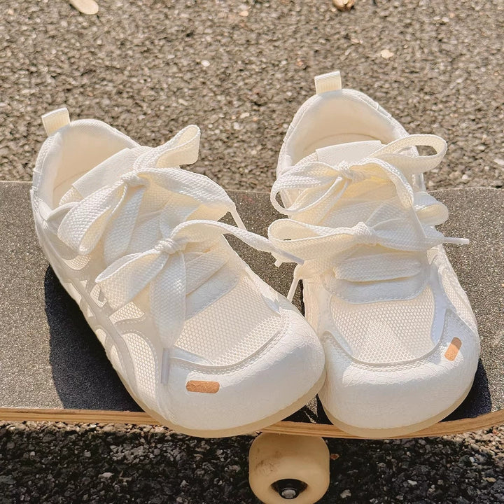 Damen-Turnschuhe mit Kreuzriemen - Alana