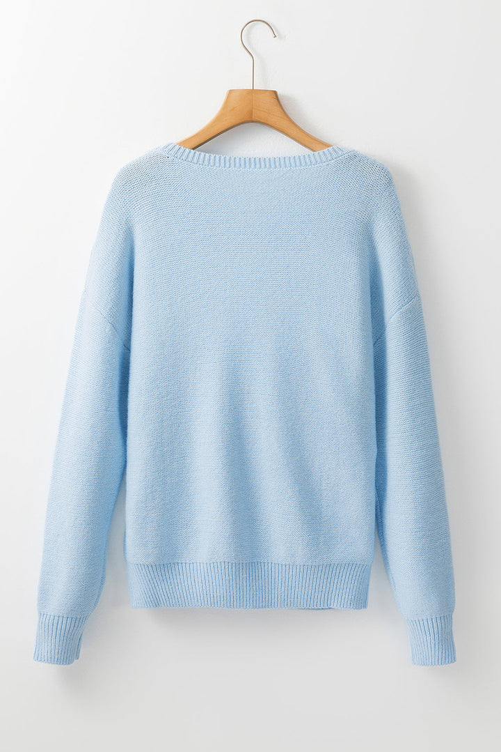 Anne - Strickpullover mit Blumenmuster und gerippten Kanten
