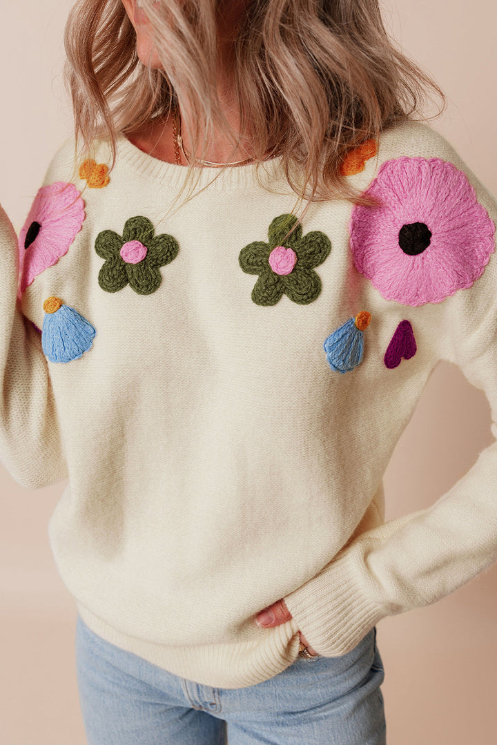 Anne - Strickpullover mit Blumenmuster und gerippten Kanten