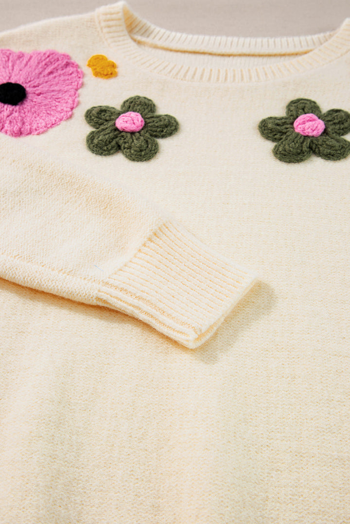 Anne - Strickpullover mit Blumenmuster und gerippten Kanten