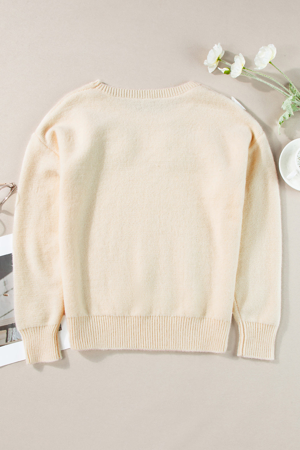 Anne - Strickpullover mit Blumenmuster und gerippten Kanten