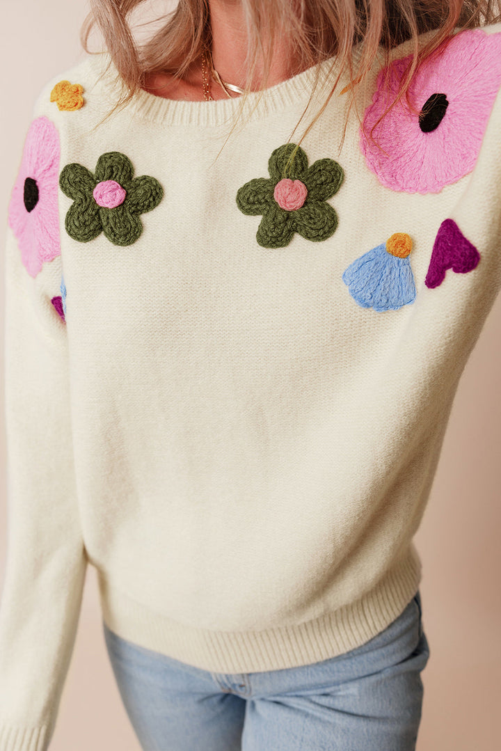 Anne - Strickpullover mit Blumenmuster und gerippten Kanten