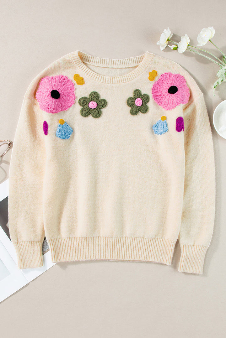 Anne - Strickpullover mit Blumenmuster und gerippten Kanten
