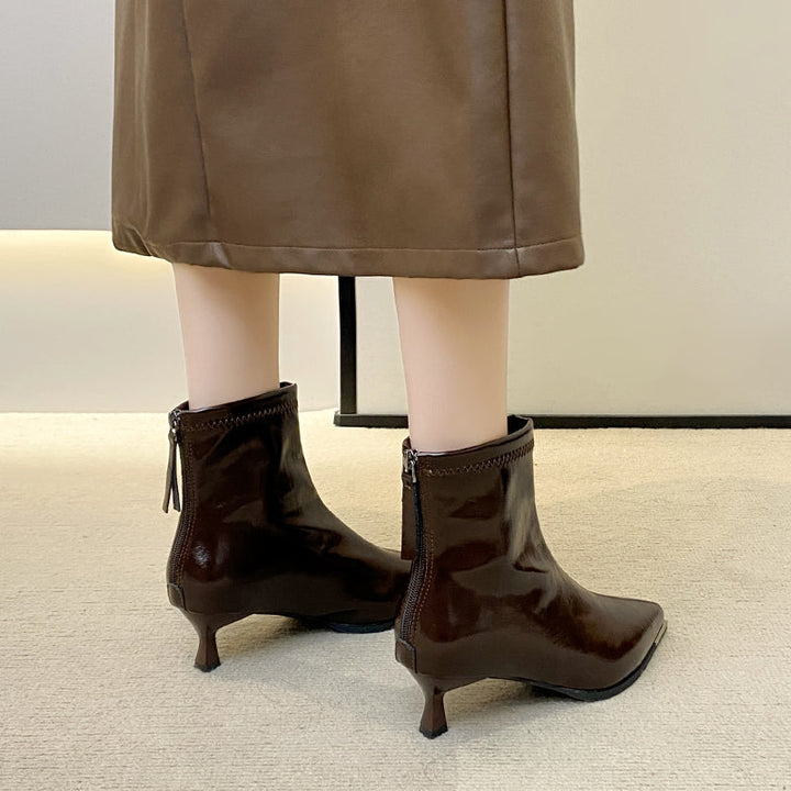 Damenstiefeletten mit spitzer Zehenpartie, schmalem Absatz und Lederoptik – Vera