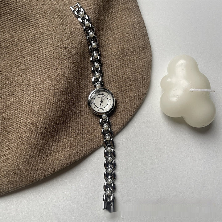 Damenarmbanduhr mit Metallarmband und Perlen