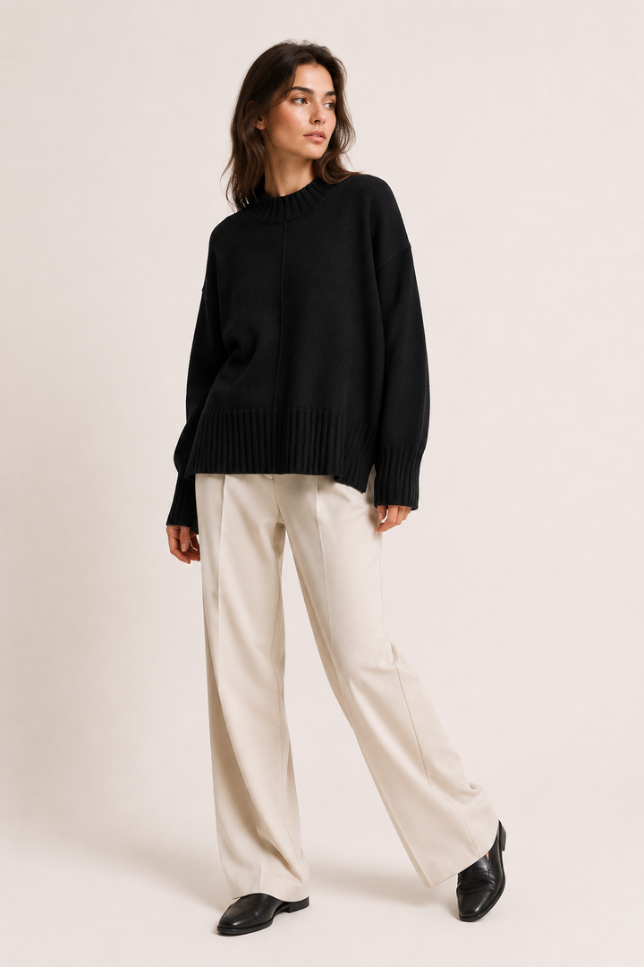 Oversize-Damenpullover mit kurzem Rollkragen und asymmetrischem Saum – Greta