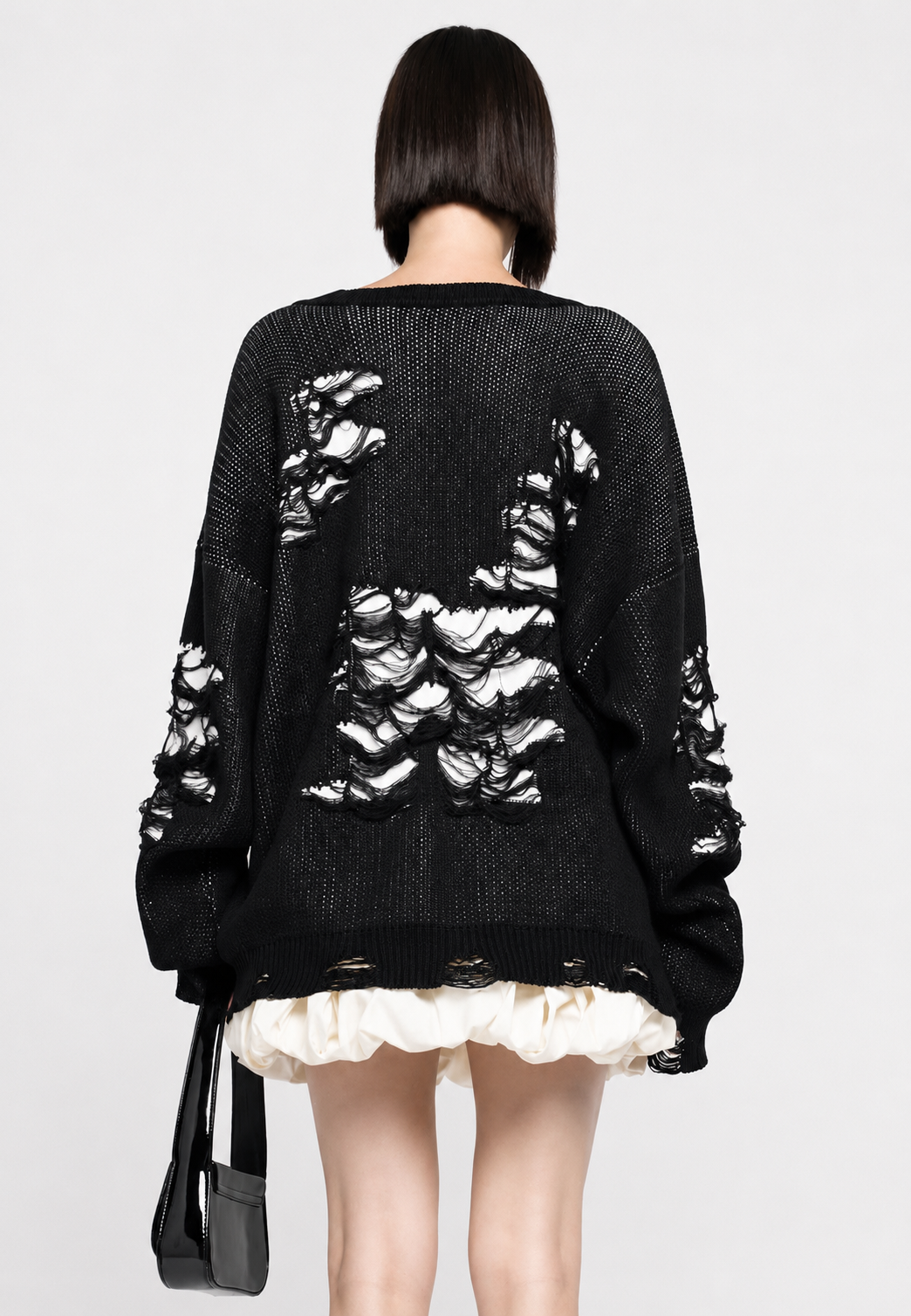 Oversize-Strickpullover für Damen mit offenem Strickmuster und dekorativen Rissen – Vianne