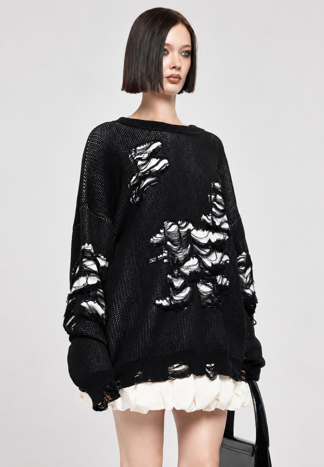 Oversize-Strickpullover für Damen mit offenem Strickmuster und dekorativen Rissen – Vianne